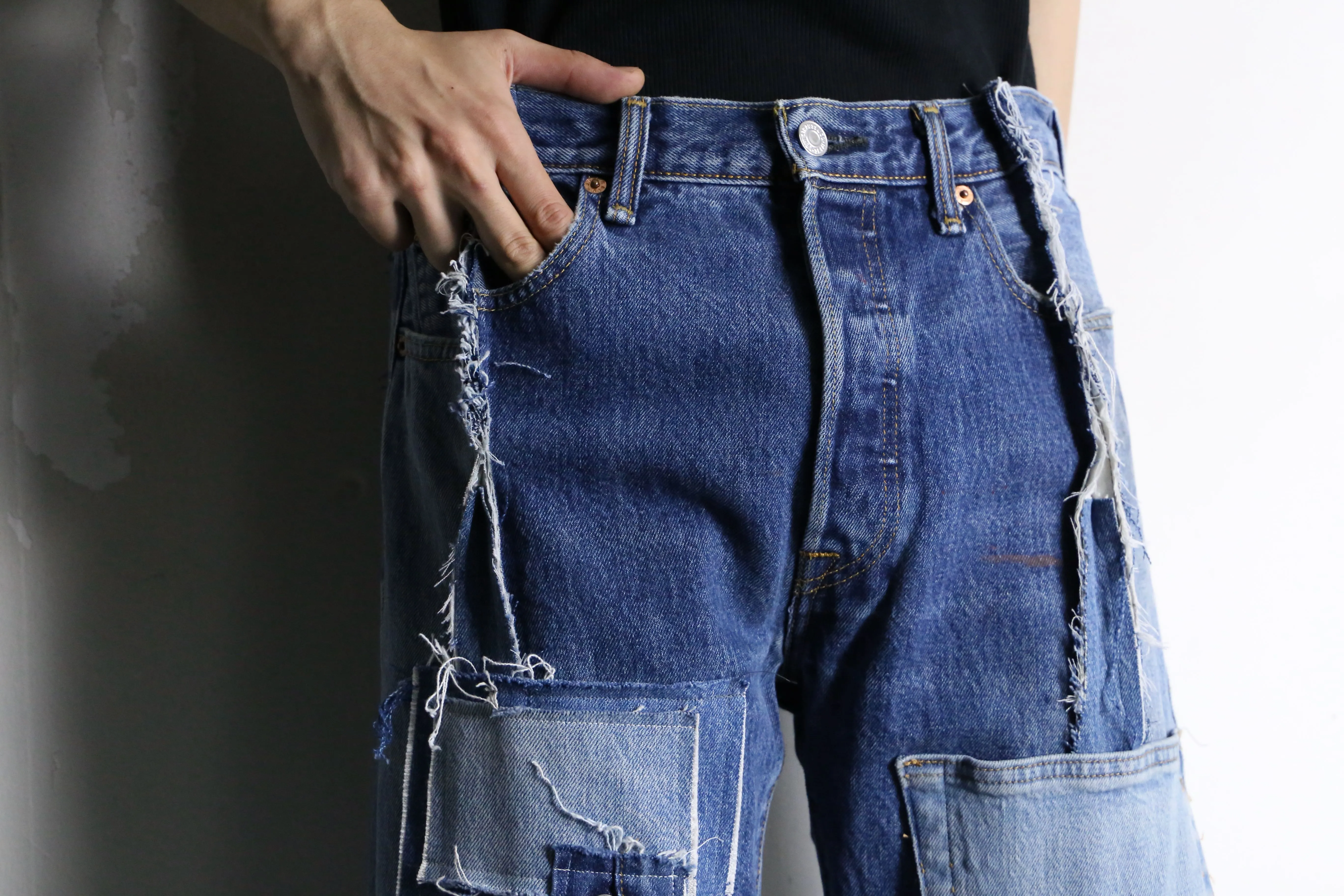 “Re:make” patchwork design super flare denim pants